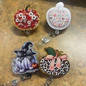 Set of Four Pumpkins alligator badge reels